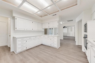 Tucked beneath mature trees in one of Rockwall's most on The Shores Country Club in Texas - for sale on GolfHomes.com, golf home, golf lot