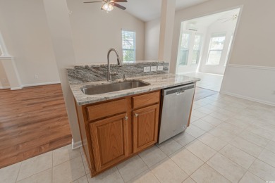 Welcome to 41 Bear Creek Loop! A beautiful lakefront retreat in on TPC of Myrtle Beach in South Carolina - for sale on GolfHomes.com, golf home, golf lot
