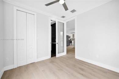 Stunningly renovated 3-bedroom, 3-bathroom home located in the on Normandy Shores Golf Course in Florida - for sale on GolfHomes.com, golf home, golf lot