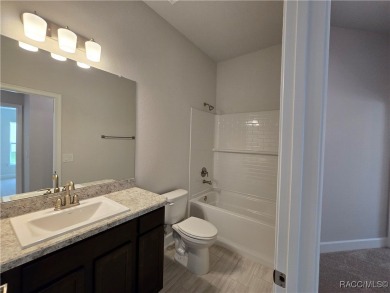 Now move-in ready! This beautifully finished 4-bedroom, 2-bath on Twisted Oaks Golf Club in Florida - for sale on GolfHomes.com, golf home, golf lot
