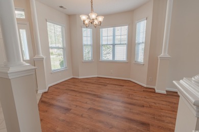 Welcome to 41 Bear Creek Loop! A beautiful lakefront retreat in on TPC of Myrtle Beach in South Carolina - for sale on GolfHomes.com, golf home, golf lot