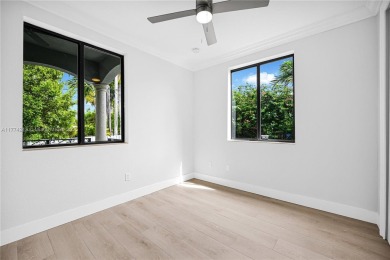 Stunningly renovated 3-bedroom, 3-bathroom home located in the on Normandy Shores Golf Course in Florida - for sale on GolfHomes.com, golf home, golf lot