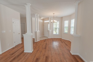 Welcome to 41 Bear Creek Loop! A beautiful lakefront retreat in on TPC of Myrtle Beach in South Carolina - for sale on GolfHomes.com, golf home, golf lot