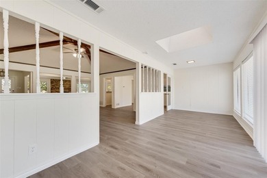 Tucked beneath mature trees in one of Rockwall's most on The Shores Country Club in Texas - for sale on GolfHomes.com, golf home, golf lot