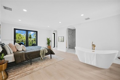 Stunningly renovated 3-bedroom, 3-bathroom home located in the on Normandy Shores Golf Course in Florida - for sale on GolfHomes.com, golf home, golf lot
