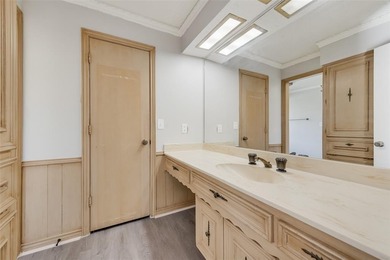 Tucked beneath mature trees in one of Rockwall's most on The Shores Country Club in Texas - for sale on GolfHomes.com, golf home, golf lot