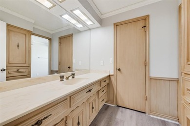 Tucked beneath mature trees in one of Rockwall's most on The Shores Country Club in Texas - for sale on GolfHomes.com, golf home, golf lot