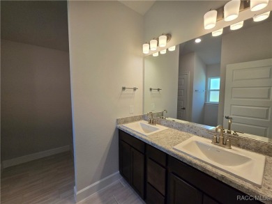 Now move-in ready! This beautifully finished 4-bedroom, 2-bath on Twisted Oaks Golf Club in Florida - for sale on GolfHomes.com, golf home, golf lot