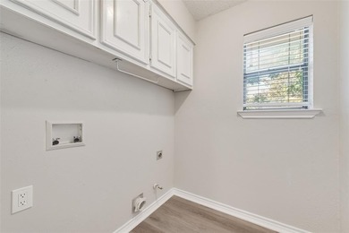 Tucked beneath mature trees in one of Rockwall's most on The Shores Country Club in Texas - for sale on GolfHomes.com, golf home, golf lot