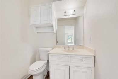 Tucked beneath mature trees in one of Rockwall's most on The Shores Country Club in Texas - for sale on GolfHomes.com, golf home, golf lot