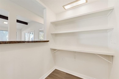 Tucked beneath mature trees in one of Rockwall's most on The Shores Country Club in Texas - for sale on GolfHomes.com, golf home, golf lot