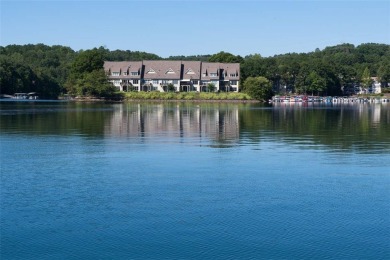 The Keowee Life awaits you! This waterfront, second-floor corner on Keowee Key Golf and Country Club in South Carolina - for sale on GolfHomes.com, golf home, golf lot