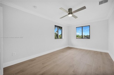 Stunningly renovated 3-bedroom, 3-bathroom home located in the on Normandy Shores Golf Course in Florida - for sale on GolfHomes.com, golf home, golf lot