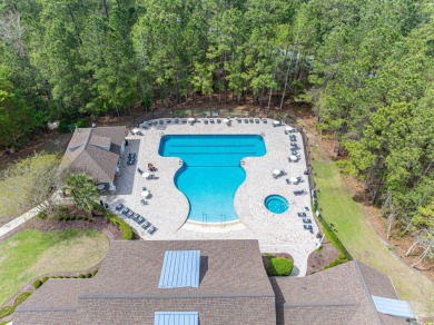 Welcome to 41 Bear Creek Loop! A beautiful lakefront retreat in on TPC of Myrtle Beach in South Carolina - for sale on GolfHomes.com, golf home, golf lot