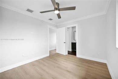 Stunningly renovated 3-bedroom, 3-bathroom home located in the on Normandy Shores Golf Course in Florida - for sale on GolfHomes.com, golf home, golf lot