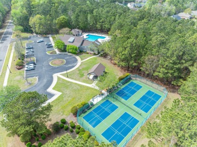 Welcome to 41 Bear Creek Loop! A beautiful lakefront retreat in on TPC of Myrtle Beach in South Carolina - for sale on GolfHomes.com, golf home, golf lot