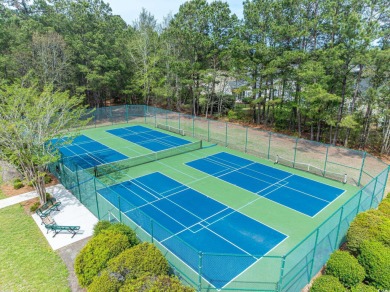 Welcome to 41 Bear Creek Loop! A beautiful lakefront retreat in on TPC of Myrtle Beach in South Carolina - for sale on GolfHomes.com, golf home, golf lot
