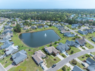 Welcome to 41 Bear Creek Loop! A beautiful lakefront retreat in on TPC of Myrtle Beach in South Carolina - for sale on GolfHomes.com, golf home, golf lot