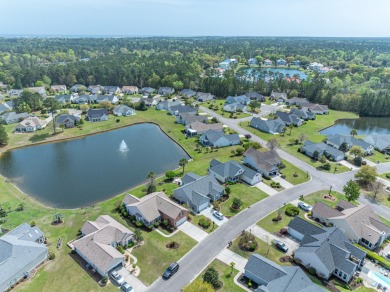 Welcome to 41 Bear Creek Loop! A beautiful lakefront retreat in on TPC of Myrtle Beach in South Carolina - for sale on GolfHomes.com, golf home, golf lot