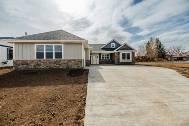 Stunning new construction home offering the quality and on Hidden Bridge Golf Club in Wyoming - for sale on GolfHomes.com, golf home, golf lot