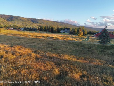 Spring Creek Farms is home to this beautiful 9.23 acre parcel on Targhee Village Golf Course in Wyoming - for sale on GolfHomes.com, golf home, golf lot