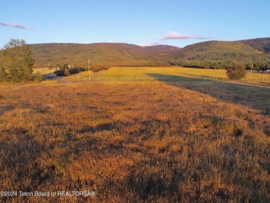 Spring Creek Farms is home to this beautiful 9.23 acre parcel on Targhee Village Golf Course in Wyoming - for sale on GolfHomes.com, golf home, golf lot