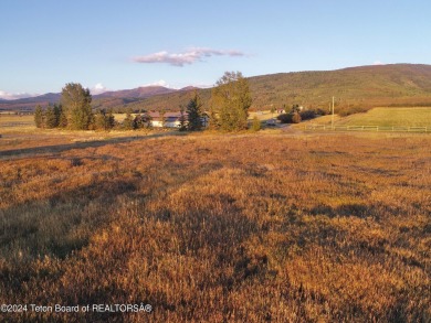 Spring Creek Farms is home to this beautiful 9.23 acre parcel on Targhee Village Golf Course in Wyoming - for sale on GolfHomes.com, golf home, golf lot