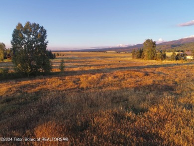 Spring Creek Farms is home to this beautiful 9.23 acre parcel on Targhee Village Golf Course in Wyoming - for sale on GolfHomes.com, golf home, golf lot