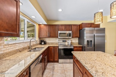 Welcome to your private resort in the heart of Pelican Bay! This on The Club At Pelican Bay - North Course in Florida - for sale on GolfHomes.com, golf home, golf lot