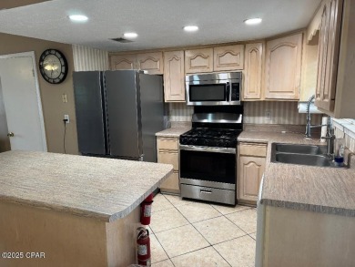 Large lot, waterfront, end unit featuring 2.5 baths, great views on Edgewater Beach Resort in Florida - for sale on GolfHomes.com, golf home, golf lot