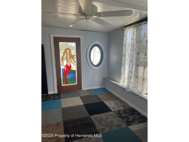 Calling all retired manatee and mermaid lovers, this on Brookridge Country Club in Florida - for sale on GolfHomes.com, golf home, golf lot