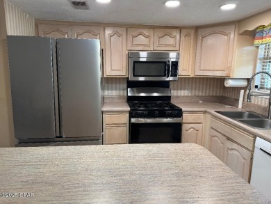 Large lot, waterfront, end unit featuring 2.5 baths, great views on Edgewater Beach Resort in Florida - for sale on GolfHomes.com, golf home, golf lot
