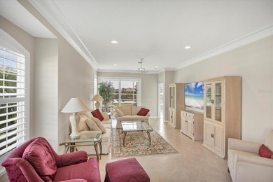 One or more photo(s) has been virtually staged. BEYOND on Pelican Pointe Golf and Country Club in Florida - for sale on GolfHomes.com, golf home, golf lot