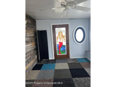 Calling all retired manatee and mermaid lovers, this on Brookridge Country Club in Florida - for sale on GolfHomes.com, golf home, golf lot