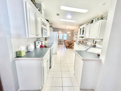 This beautifully renovated residence features 2 bedrooms and 2 on Crane Lakes Golf and Country Club in Florida - for sale on GolfHomes.com, golf home, golf lot