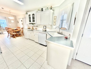 This beautifully renovated residence features 2 bedrooms and 2 on Crane Lakes Golf and Country Club in Florida - for sale on GolfHomes.com, golf home, golf lot