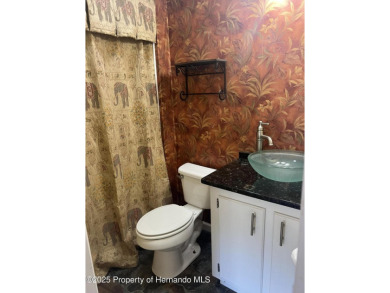 Calling all retired manatee and mermaid lovers, this on Brookridge Country Club in Florida - for sale on GolfHomes.com, golf home, golf lot