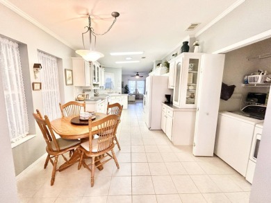 This beautifully renovated residence features 2 bedrooms and 2 on Crane Lakes Golf and Country Club in Florida - for sale on GolfHomes.com, golf home, golf lot