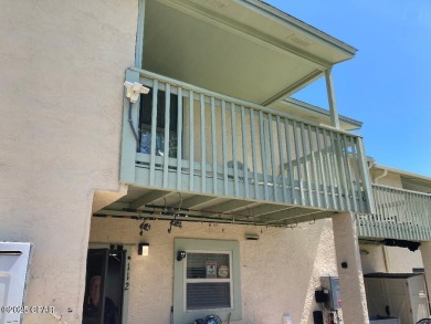 Large lot, waterfront, end unit featuring 2.5 baths, great views on Edgewater Beach Resort in Florida - for sale on GolfHomes.com, golf home, golf lot