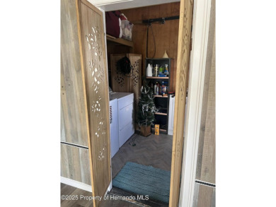 Calling all retired manatee and mermaid lovers, this on Brookridge Country Club in Florida - for sale on GolfHomes.com, golf home, golf lot