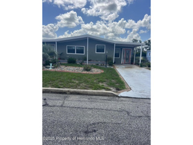 Calling all retired manatee and mermaid lovers, this on Brookridge Country Club in Florida - for sale on GolfHomes.com, golf home, golf lot