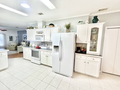 This beautifully renovated residence features 2 bedrooms and 2 on Crane Lakes Golf and Country Club in Florida - for sale on GolfHomes.com, golf home, golf lot