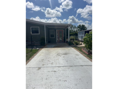 Calling all retired manatee and mermaid lovers, this on Brookridge Country Club in Florida - for sale on GolfHomes.com, golf home, golf lot