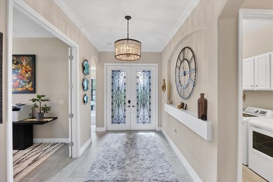 Welcome to this STUNNING home in the highly sought after on Sarasota National Golf Club in Florida - for sale on GolfHomes.com, golf home, golf lot