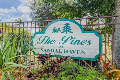 Live the good life at The Pines of Sandalhaven, a serene 55+ on Lemon Bay Golf Club in Florida - for sale on GolfHomes.com, golf home, golf lot