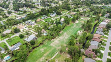 Welcome to your private resort in the heart of Pelican Bay! This on The Club At Pelican Bay - North Course in Florida - for sale on GolfHomes.com, golf home, golf lot