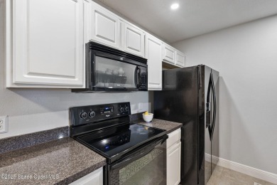 End Unit with Stunning Lake, Preserve  Golf Course Views in The on Viera East Golf Club in Florida - for sale on GolfHomes.com, golf home, golf lot
