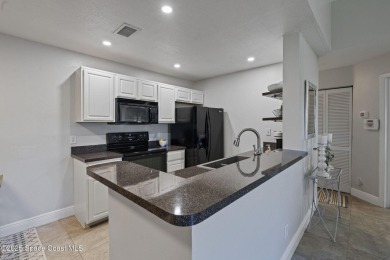 End Unit with Stunning Lake, Preserve  Golf Course Views in The on Viera East Golf Club in Florida - for sale on GolfHomes.com, golf home, golf lot