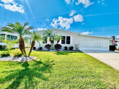 This beautifully renovated residence features 2 bedrooms and 2 on Crane Lakes Golf and Country Club in Florida - for sale on GolfHomes.com, golf home, golf lot