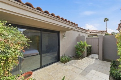 The seller truly delivers on the promise of a rose garden on Palm Valley Country Club in California - for sale on GolfHomes.com, golf home, golf lot